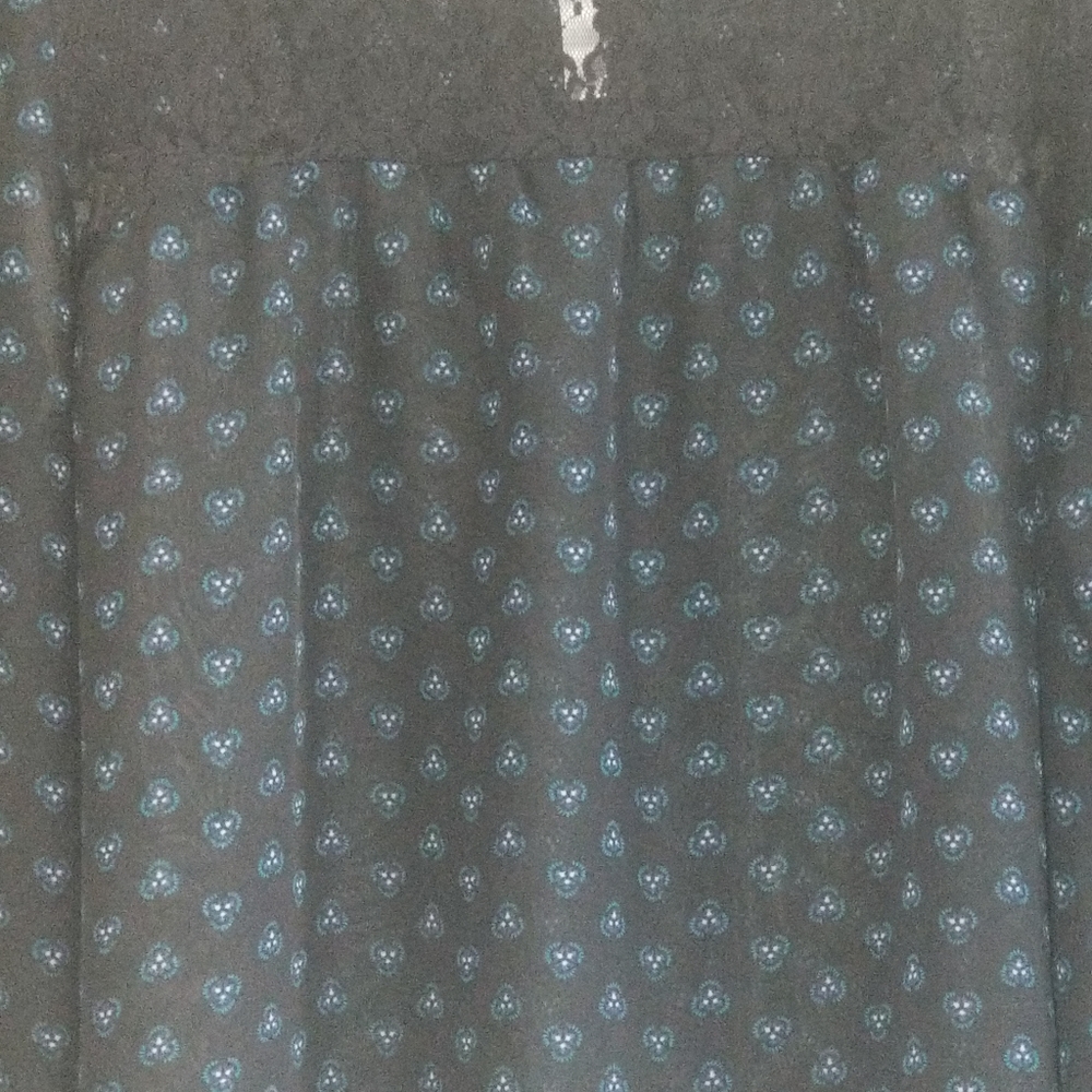 Two beautiful dresses one beautiful blouse and two beautiful skirts.
